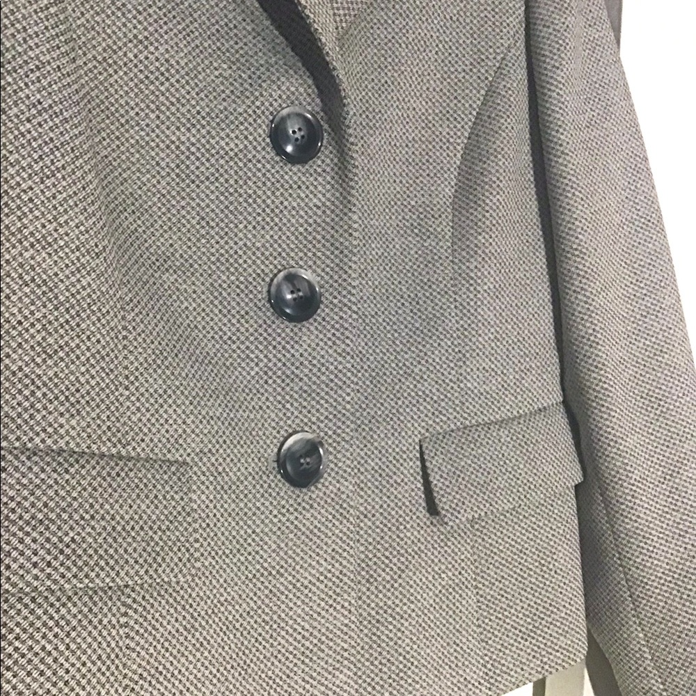 Grey suit with matching skirt. Size 6